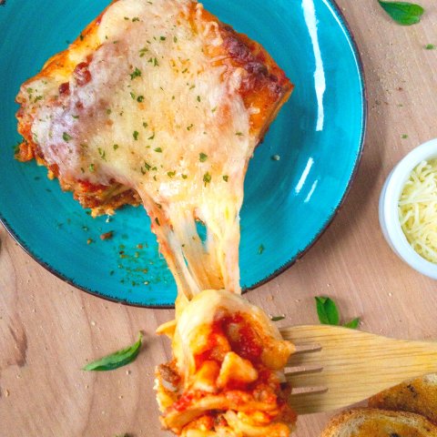 lasagna on a blue plate